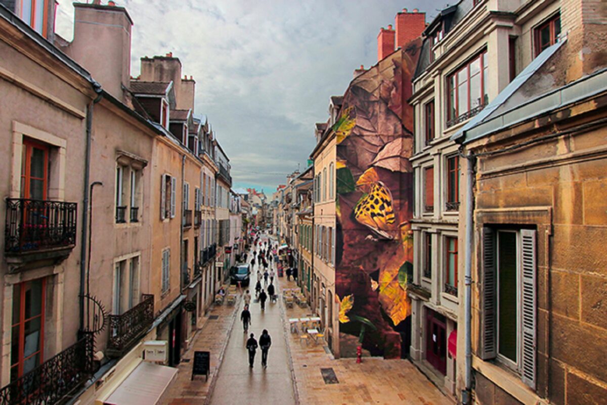 Mantra artista desenha borboletas em paredes de diversas cidades pelo mundo 8